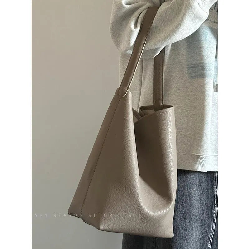 Large capacity black PU bucket shoulder tote bag with sewing thread detail