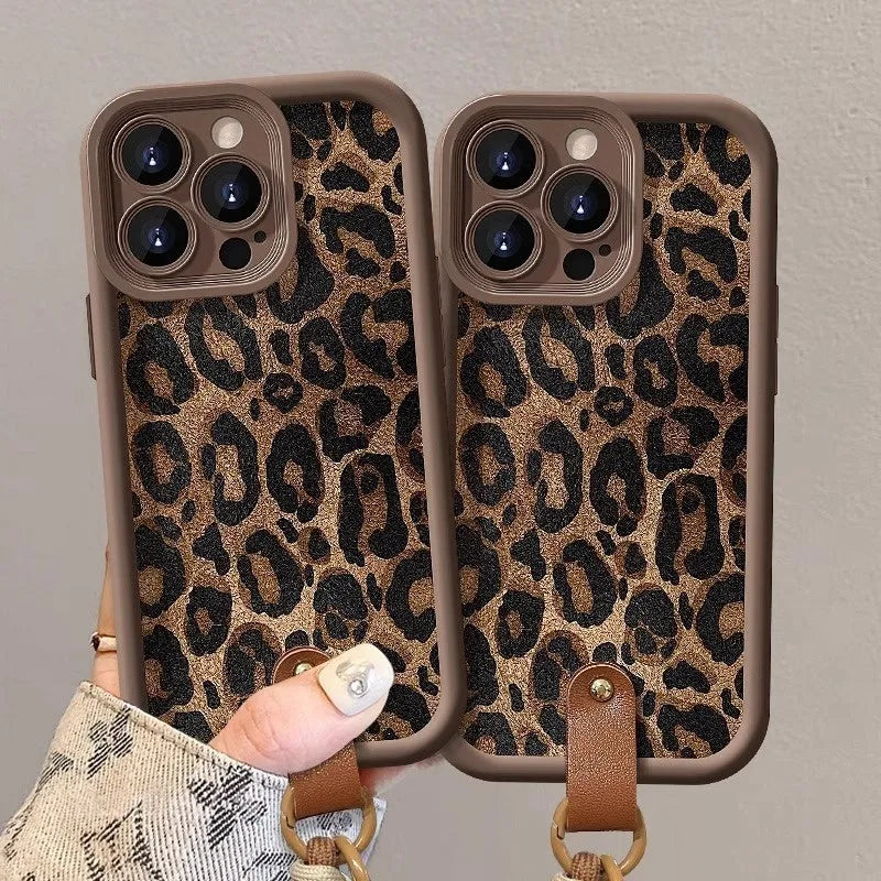 Brown leopard print silicone phone case for iPhone with an attached white lanyard strap.