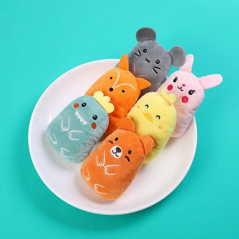 Set of four small coloured plush cat chew toys with catnip, shown next to a measuring tape indicating 11 cm length.