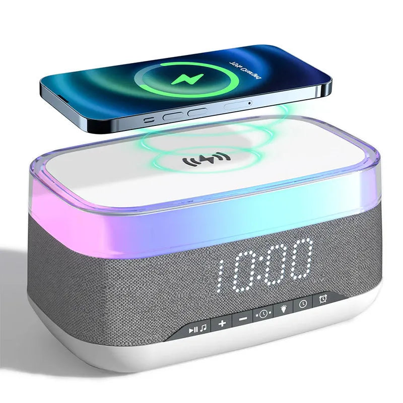 White multifunctional alarm clock with Bluetooth speaker and wireless charging pad showing night light illumination