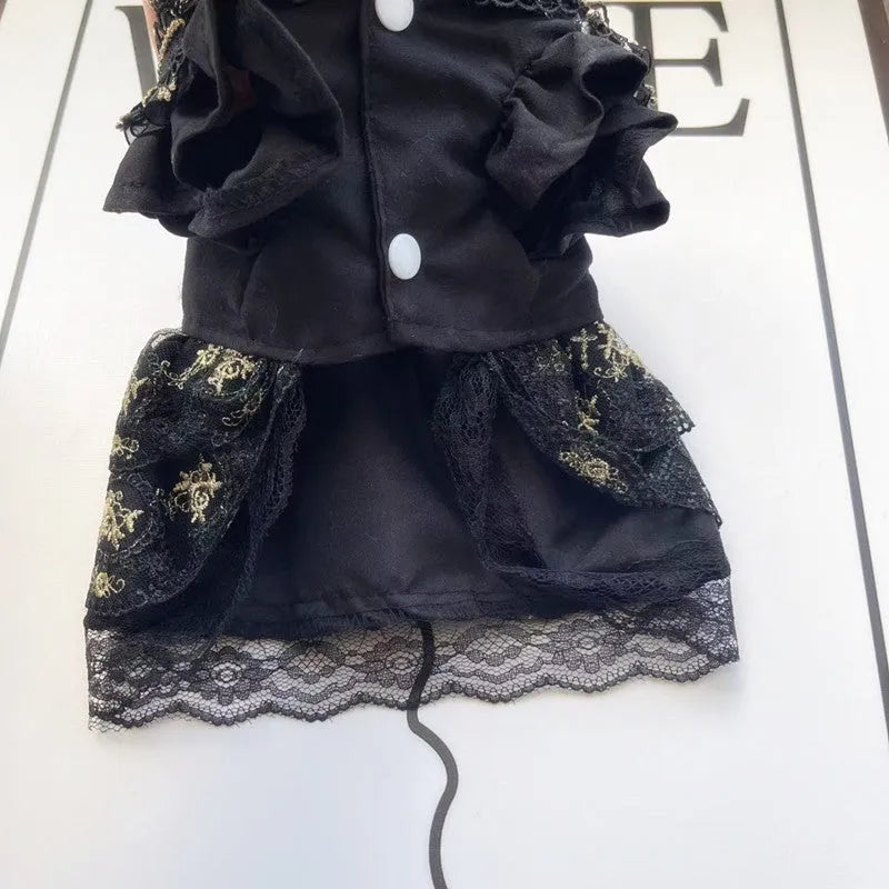 Golden gothic-style layered skirt for a small dog or cat on a mannequin, showing adjustable velvet collar.