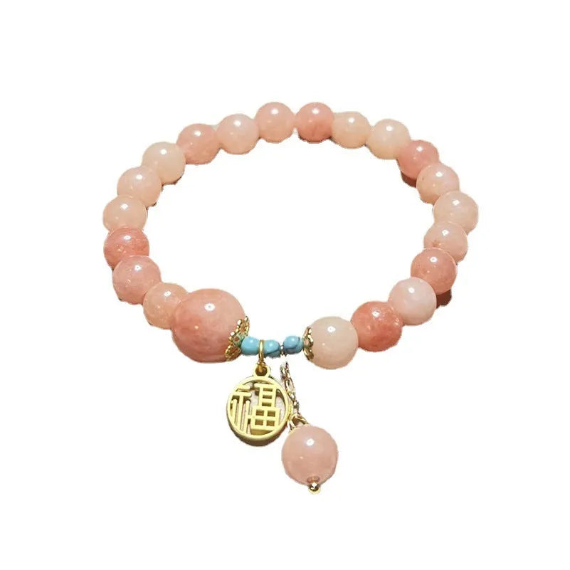 Pink natural stone charm bracelet with adjustable alloy chain for women