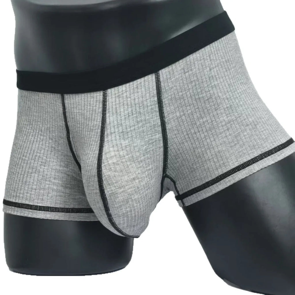 Men's solid colour breathable boxer shorts in Army Green, shown laid flat to display thin fabric and cut.