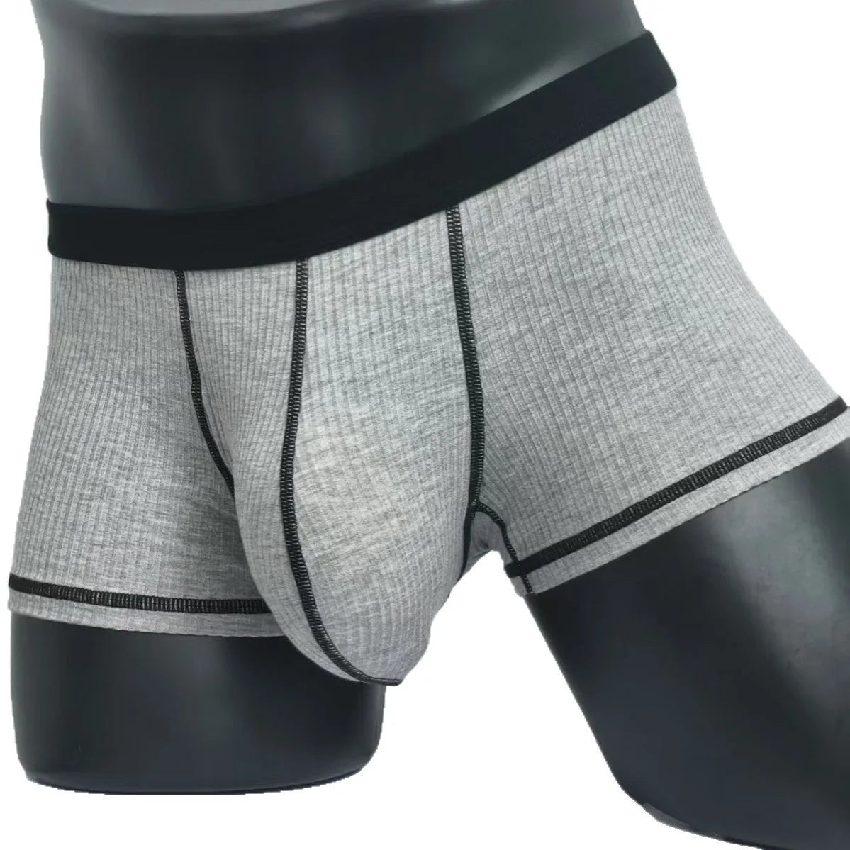 Men's solid colour breathable boxer shorts in Army Green, shown laid flat to display thin fabric and cut.