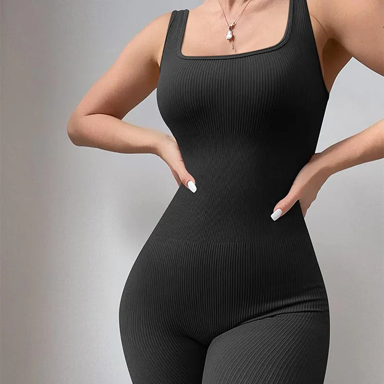 Women's long sleeve spandex suspender tank top tights bodysuit on a hanger