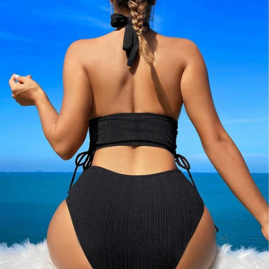 Women's black lace-up halter bikini set with briefs on mannequin