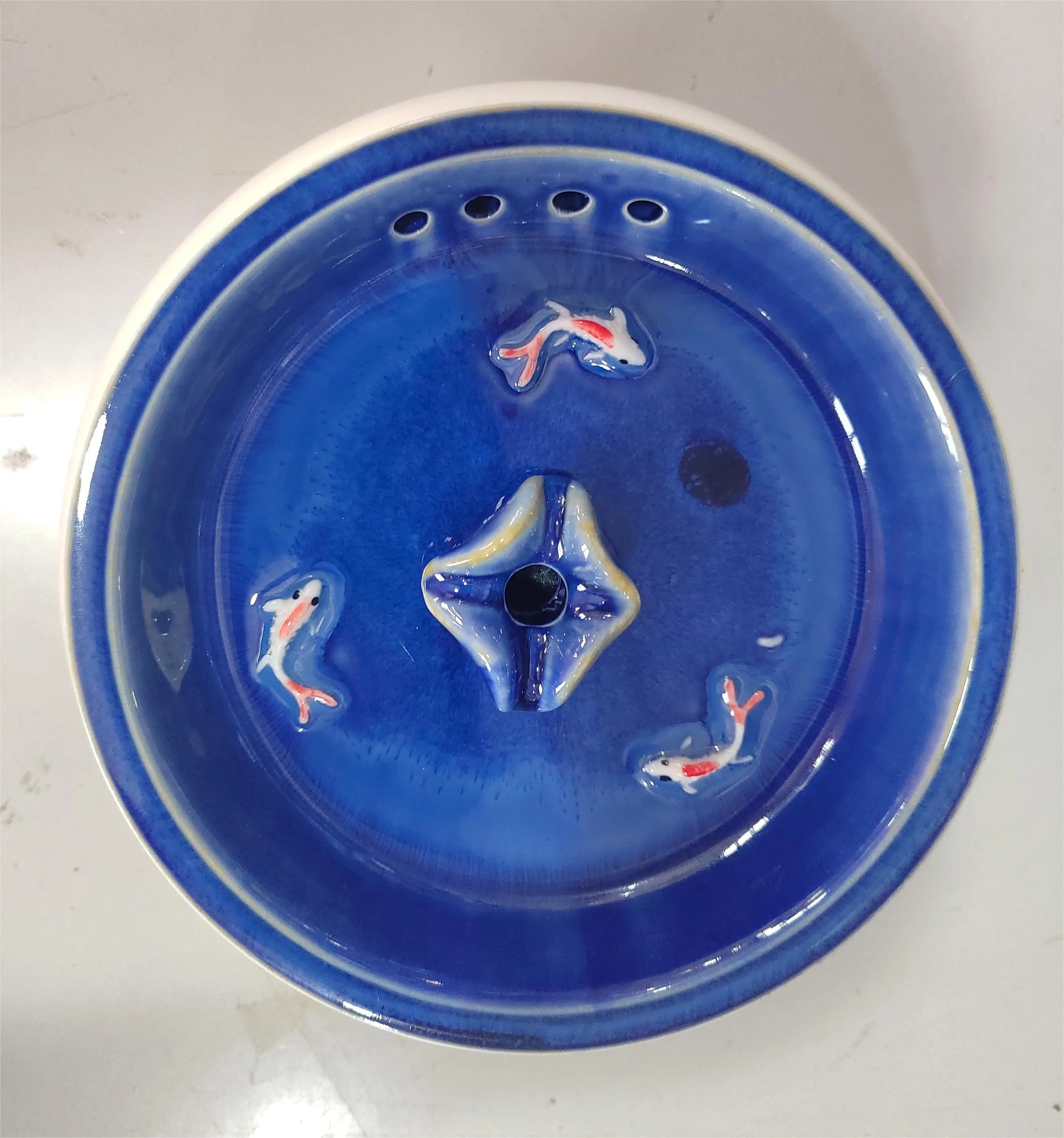 Ceramic cat automatic drinking fountain in starry sky blue with water circulation, white water pump, and USB plug option