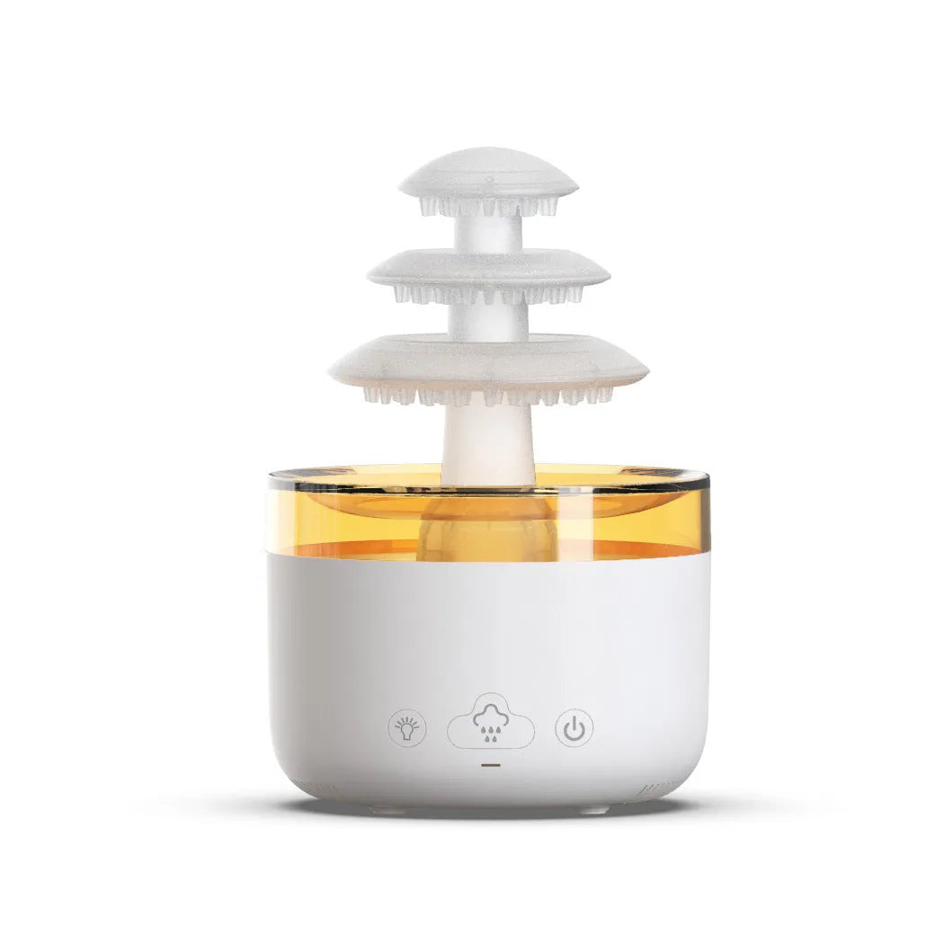 White cloud rain ultrasonic humidifier and essential oil diffuser with colourful LED lights on desk