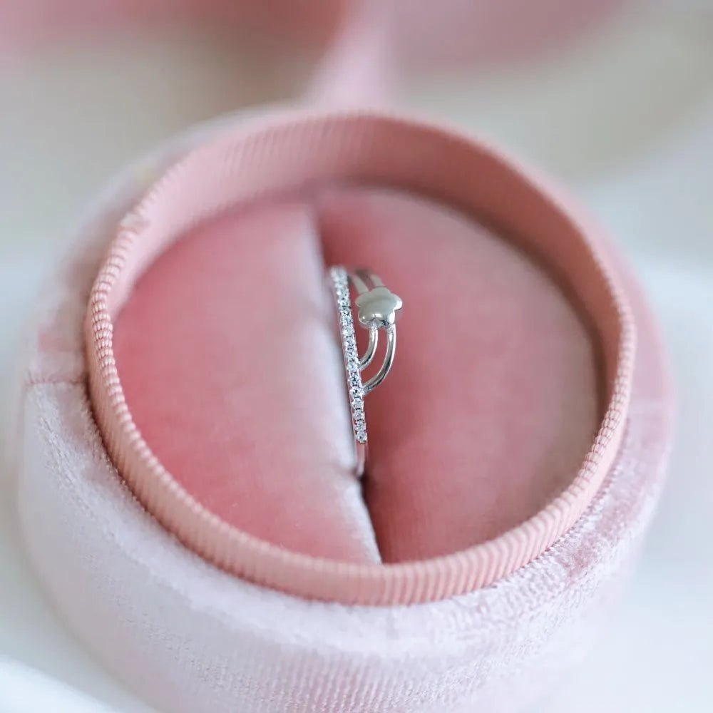 XINGX Korean-style women's S925 silver single-row diamond ring in white gold finish on a white background