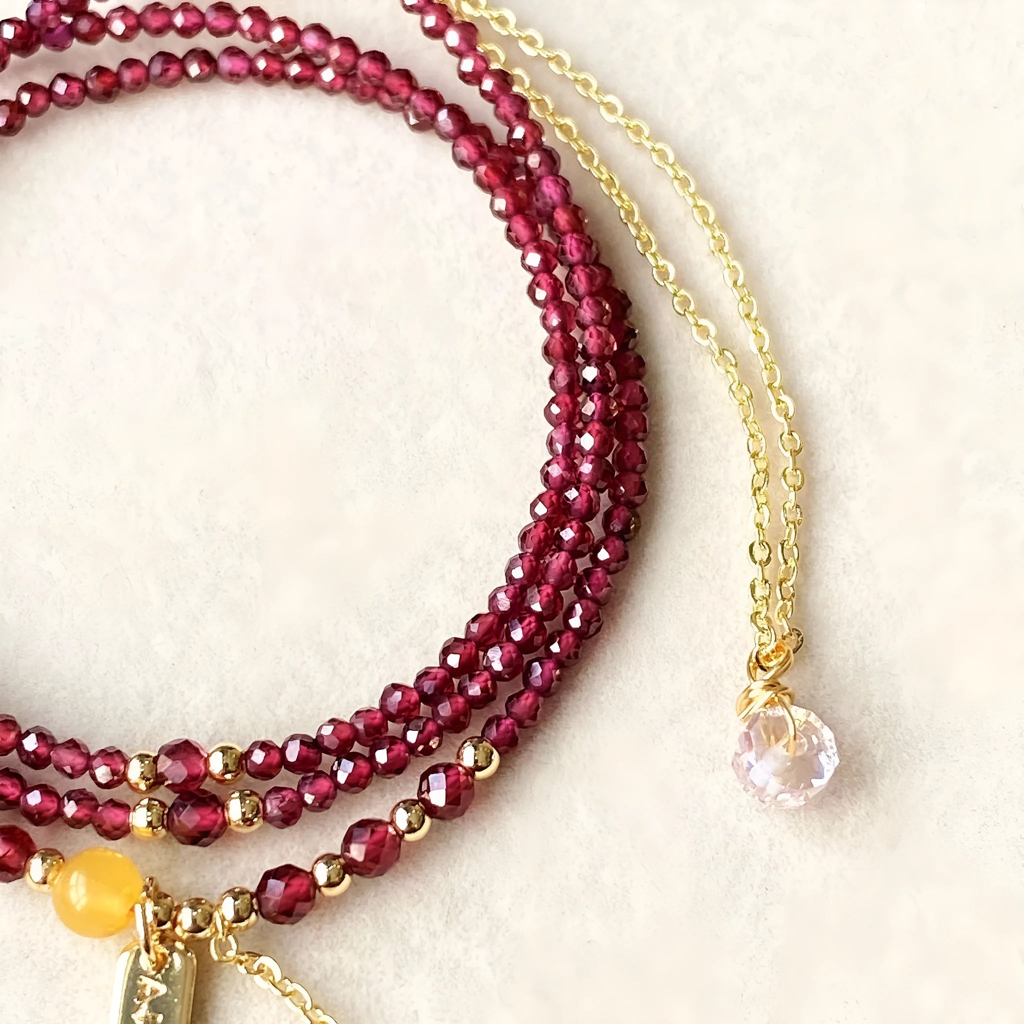Garnet wine red bracelet and necklace set with beeswax cut surface and three-circle design