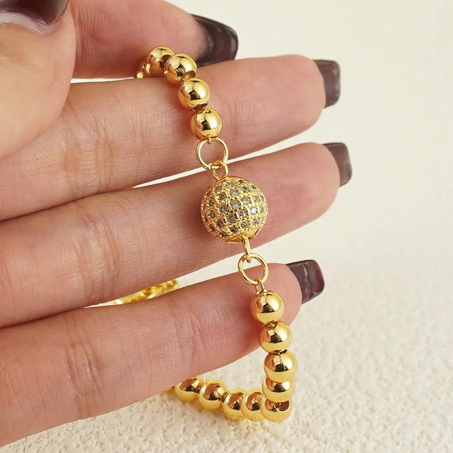 Copper plastic heart-shaped bracelet for women with round zircon stones and an electroplated finish.
