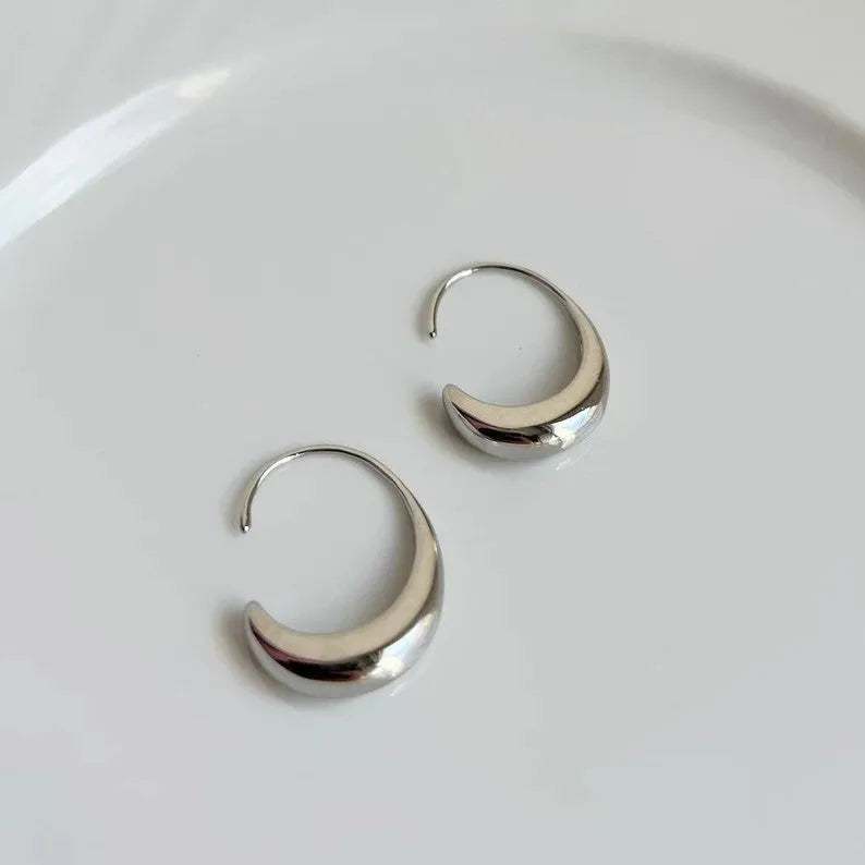 Gold and silver alloy earrings with snake design and electroplated finish