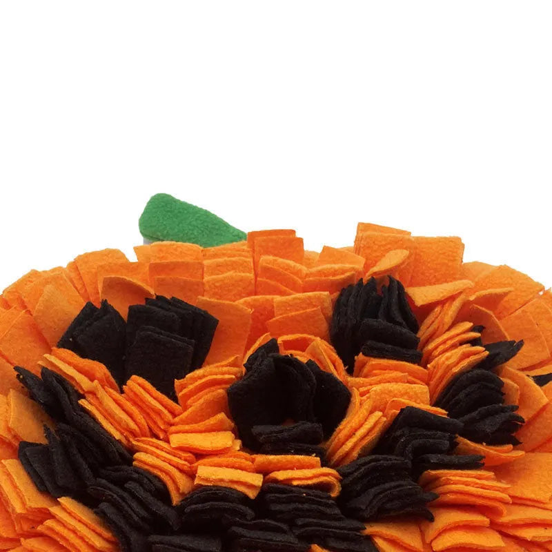 Orange pumpkin-shaped dog sniffing mat with raised fur texture for slow feeding