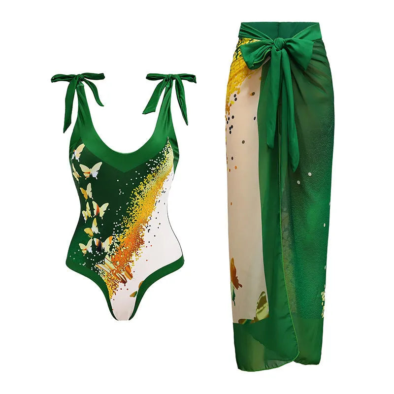 Women's solid colour one-piece swimsuit with spaghetti straps and a separate skirt.