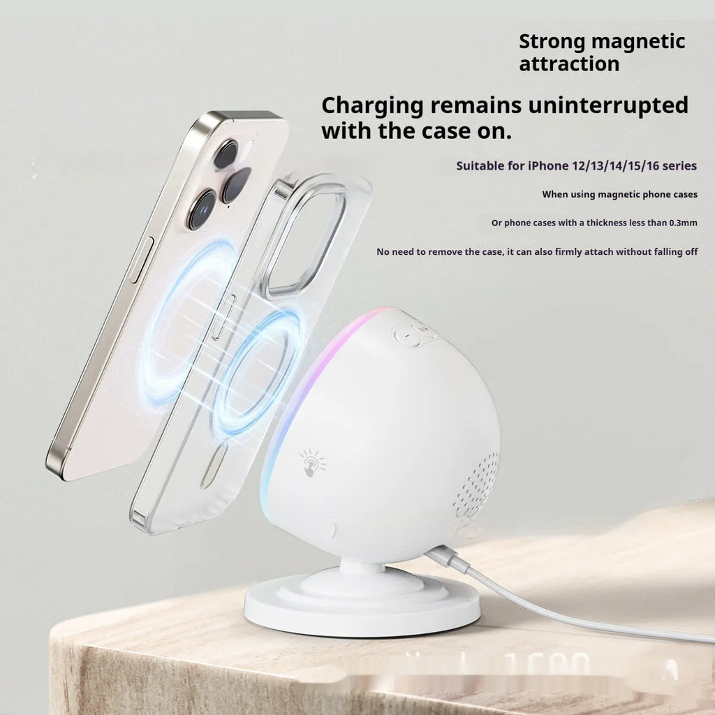 Three-in-one wireless charger with Bluetooth speaker and coloured lights in white finish on a desk