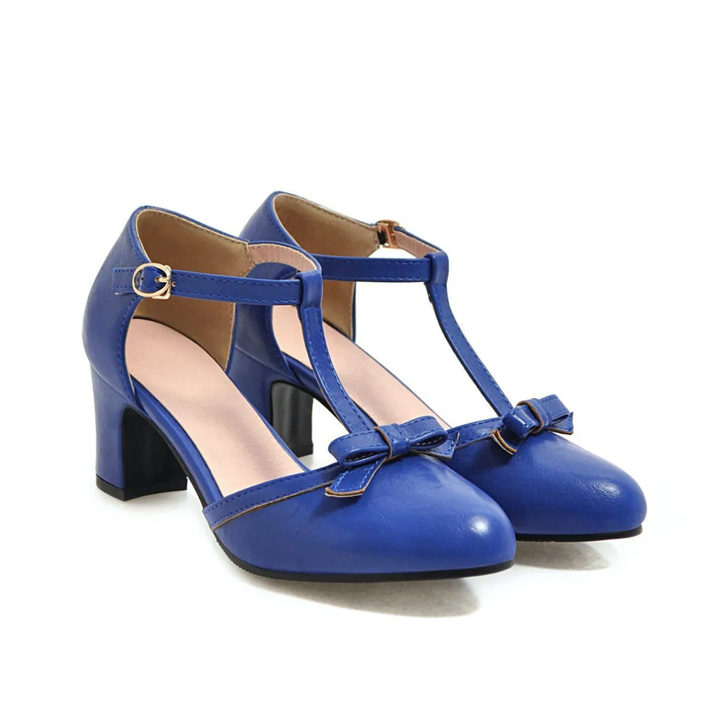 Women's platform sandals with chunky 6.5cm heel, hollow-out pattern and decorative bow detail