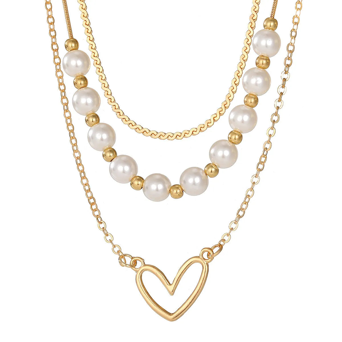 Gold tone heart-shaped pendant necklace with pearl chain, vintage love symbol jewellery