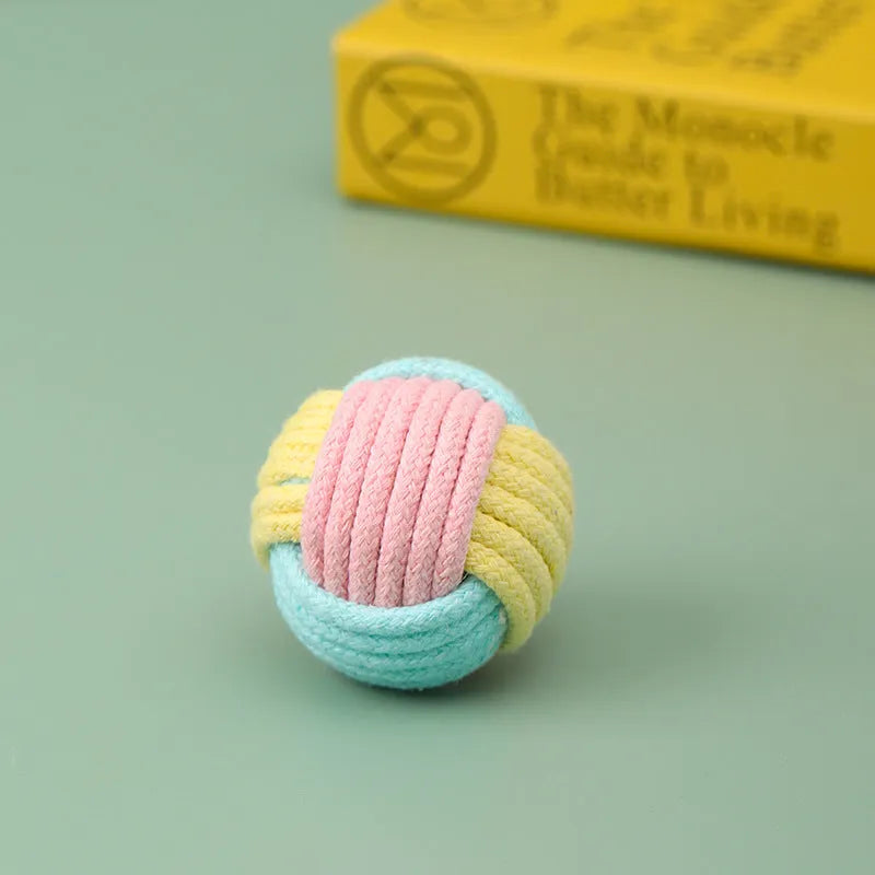 Handmade plush cotton cat hair ball toy in blue powder, green blue, or pink green colours measuring 5cm diameter