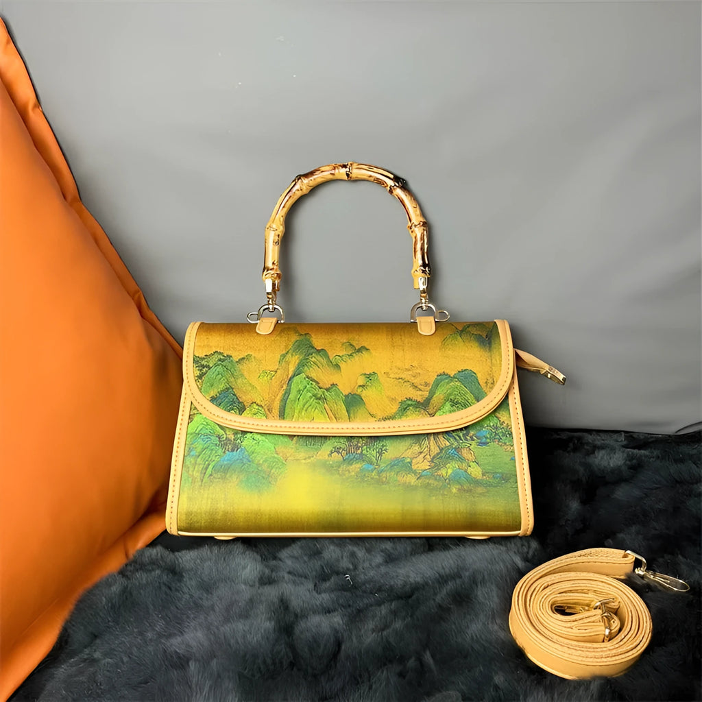 Vintage Chinese-style Xiangyun silk handbag with retro patterns, horizontal rectangular shape and single strap.