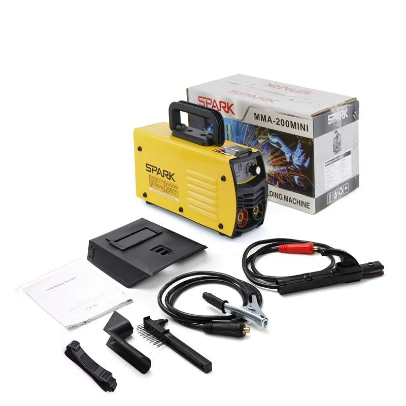 MMA-200MIN compact 220V DC inverter welding machine with welding tongs, clamp, and face shield on a workbench.