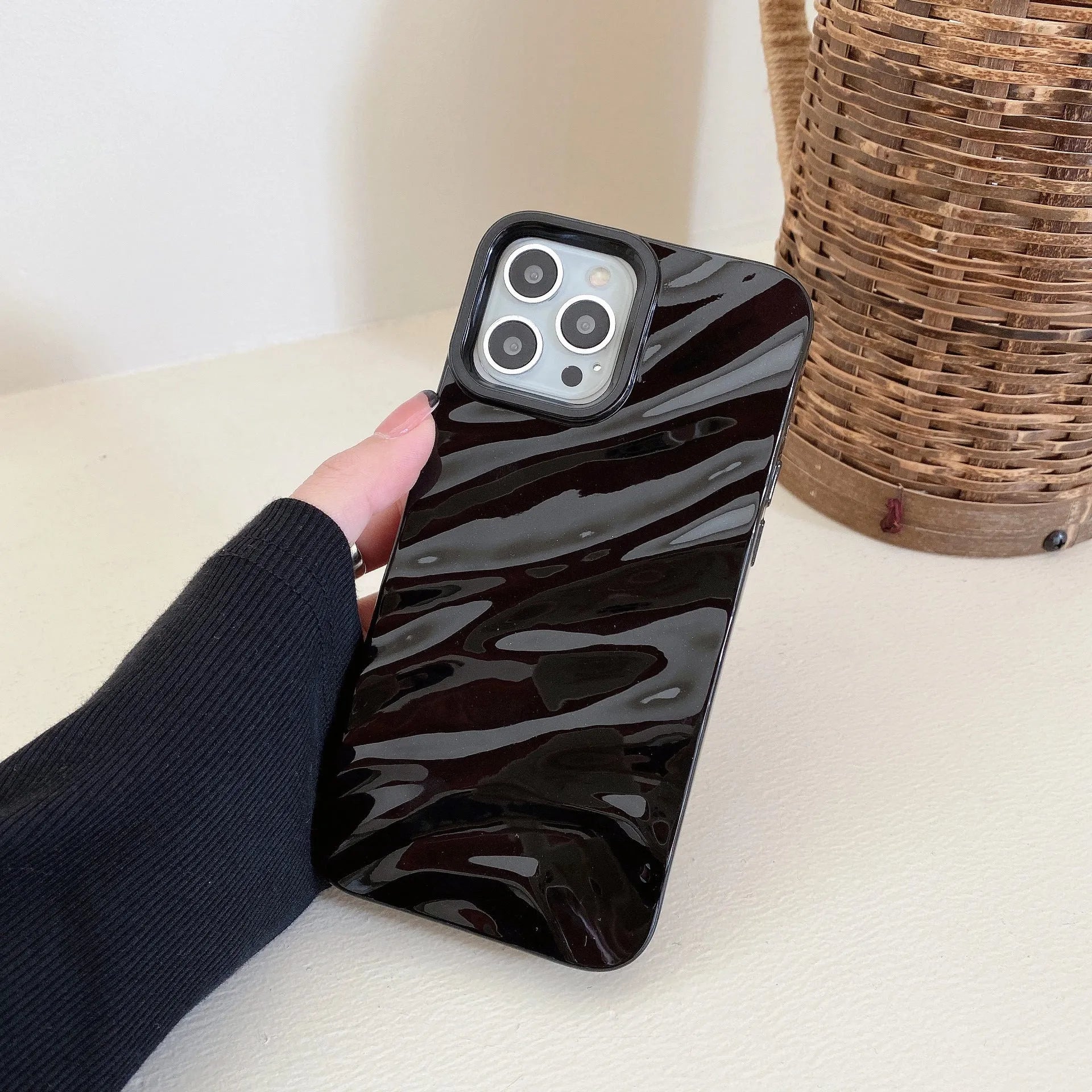 Soft wave pleated TPU phone case for Apple iPhone 17 in a selection of colours including electroplated gold and matte purple.