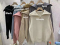 Women's loose fit pullover sweater with polo collar in soft viscose knit, solid colour, available in seven shades