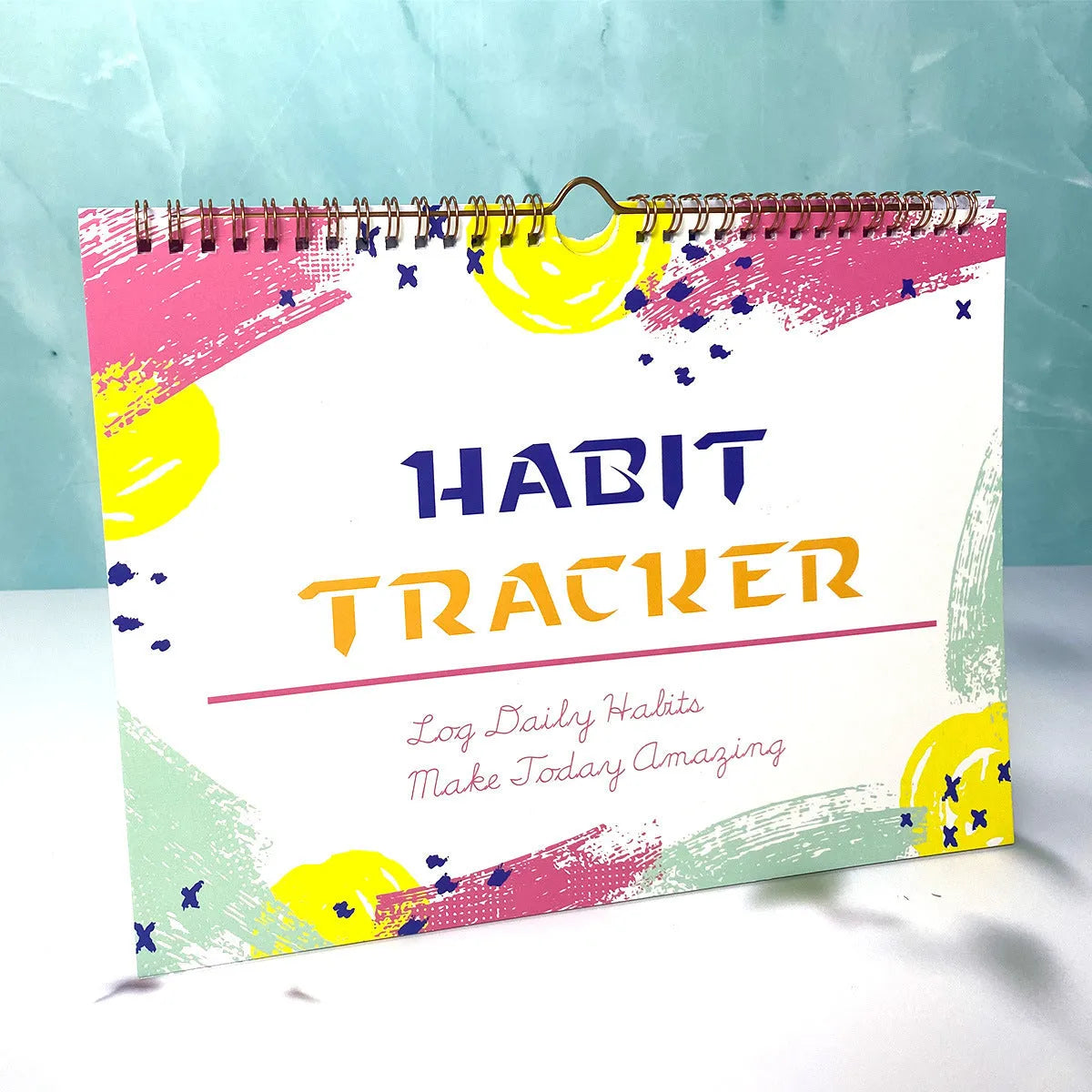 A4 habit tracking notebook with 12 pages in multiple colour options
