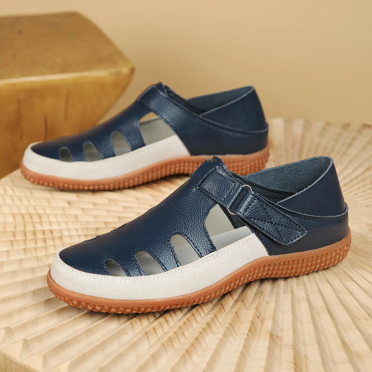 Women's plus size flat heel sandals with hollow breathable design and toe cap in blue colour