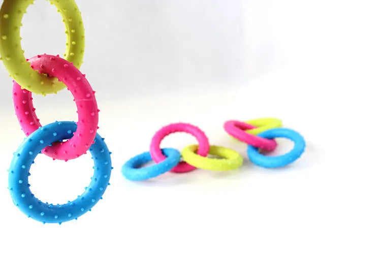 Three-chain TPR rubber dog molar toy for aggressive chewers shown in random colour