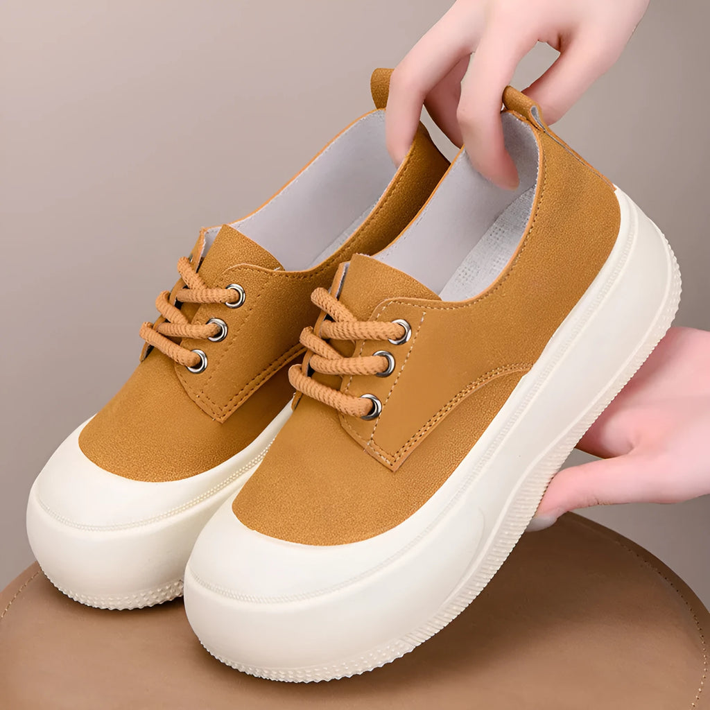 Women's beige suede platform loafers with a lace-up front and 4cm thick sole.