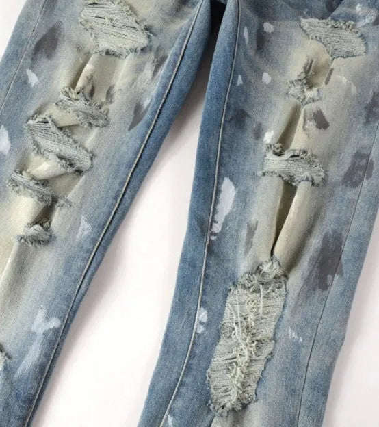 Men's patch slimming perforated denim leggings in light blue, 98% cotton, front view