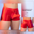 Men's red elephant nose print boxer shorts with seamless construction and mid-waist fit.