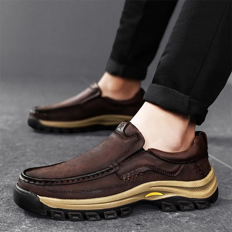 Men's black mountaineering shoes with thick rubber soles and stitched PU leather upper