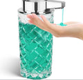 Silver automatic soap dispenser with sensor and Type-C charging port on a bathroom counter.