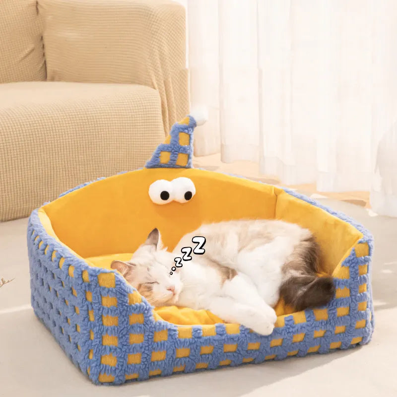 Green triangular pet sleeping nest with removable cover for cats and small dogs.