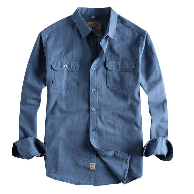 Men's light blue cotton long sleeve shirt with a regular fit and cardigan style on a hanger.
