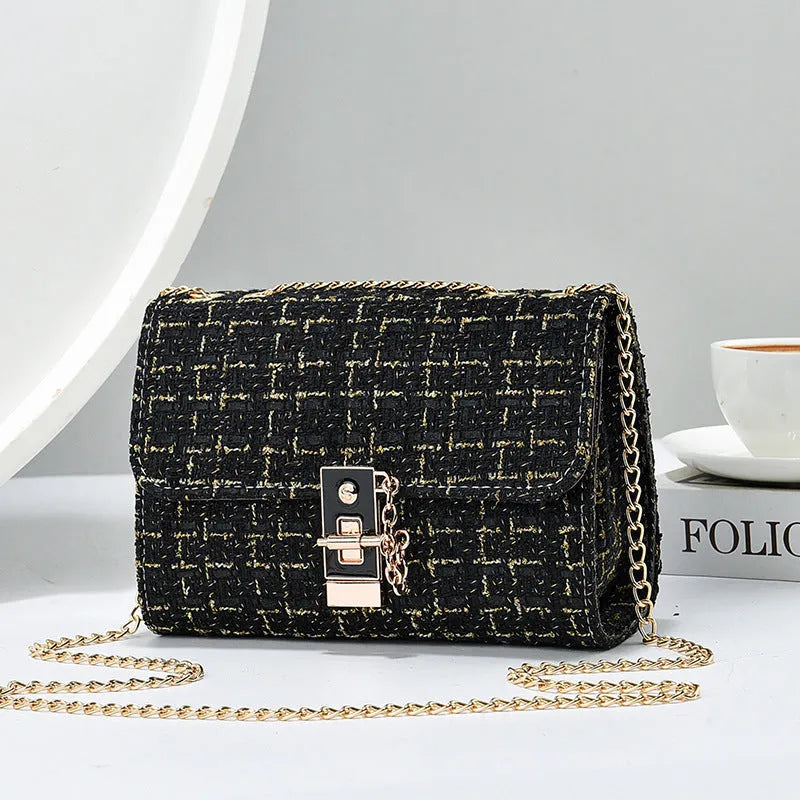 Woolen twist lock shoulder bag with gold silk contrast colour, clamshell design, and chain accent in beige