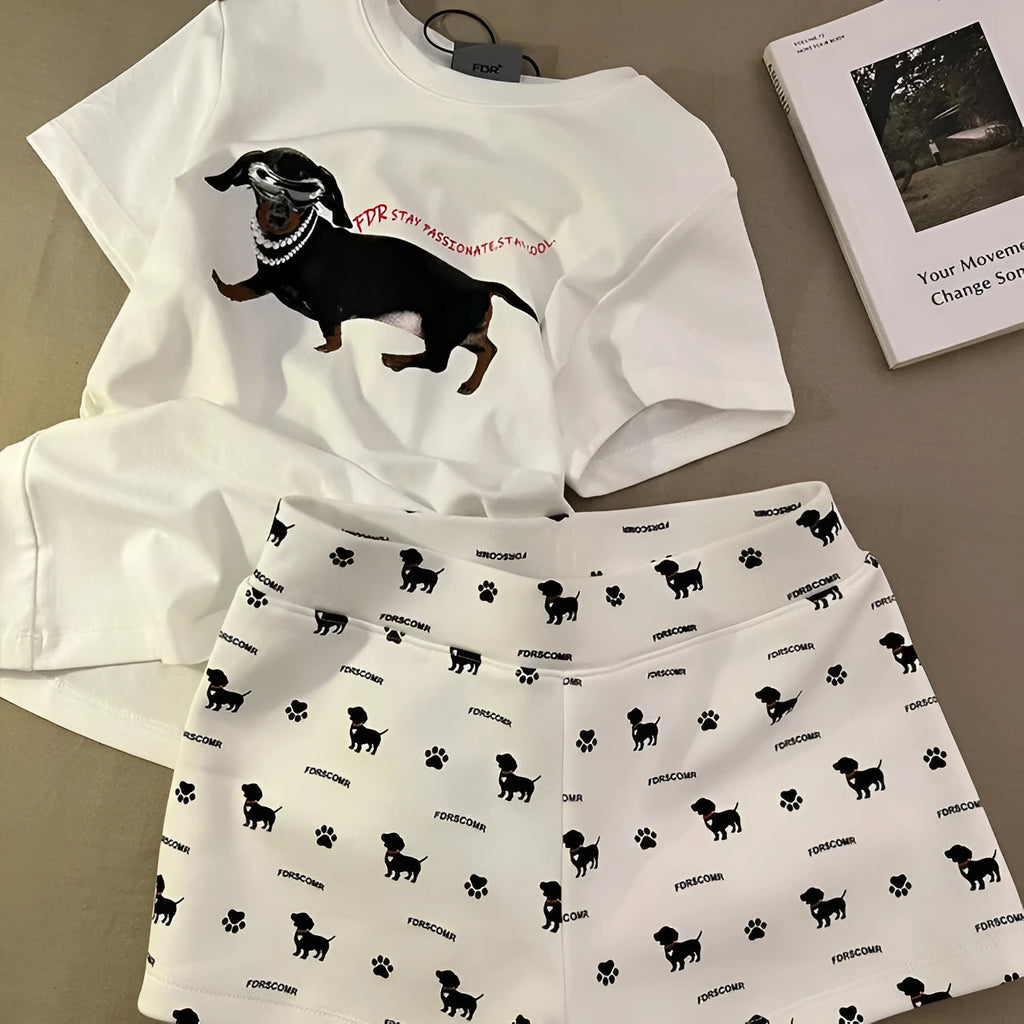 Girls short sleeve pyjama set with sausage dog print and sunglasses design in polyester
