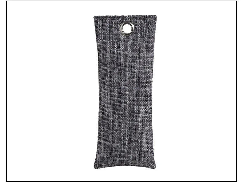 Black linen bag filled with bamboo charcoal for shoe and household odour removal.