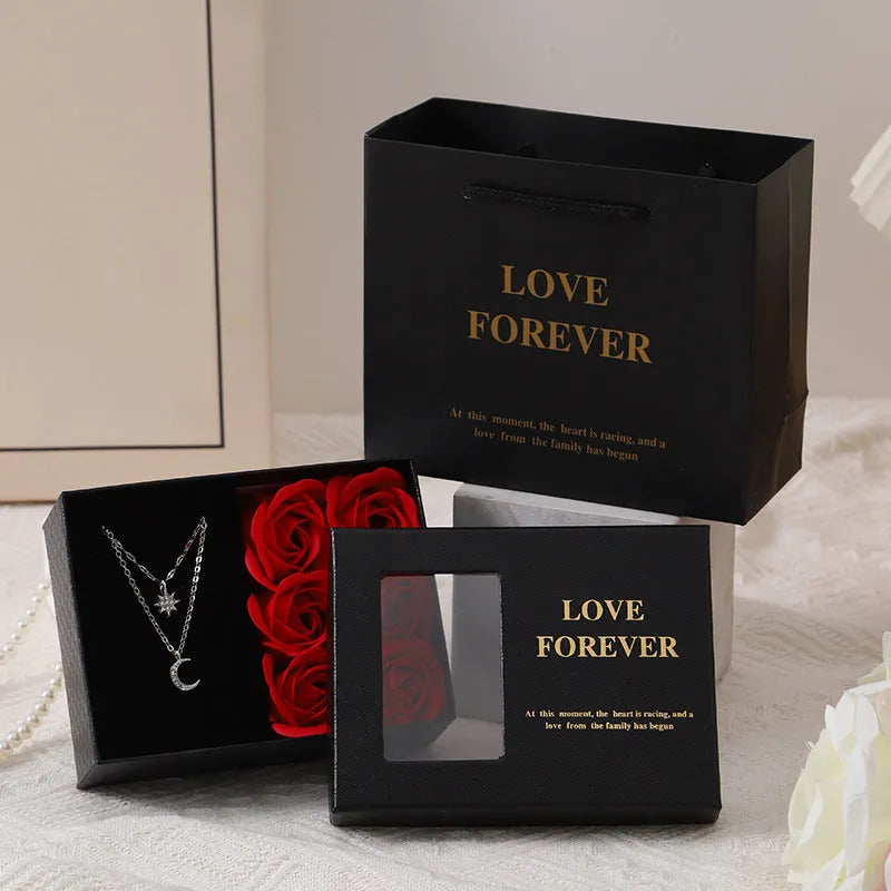 Korean style gift box with six red soap roses and a drawstring bag for Valentine's Day presents