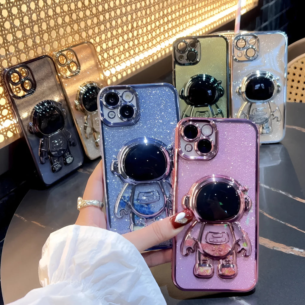 Glitter quicksand iPhone case with electroplated astronaut spaceman design and rhinestone details