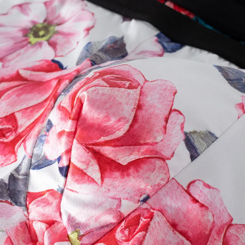Men's printed ice silk boxer shorts showing floral pattern on breathable polyester fabric with mid waist design.
