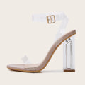 Women's Apricot high heel sandals with a transparent glass heel and a front buckle fastener.