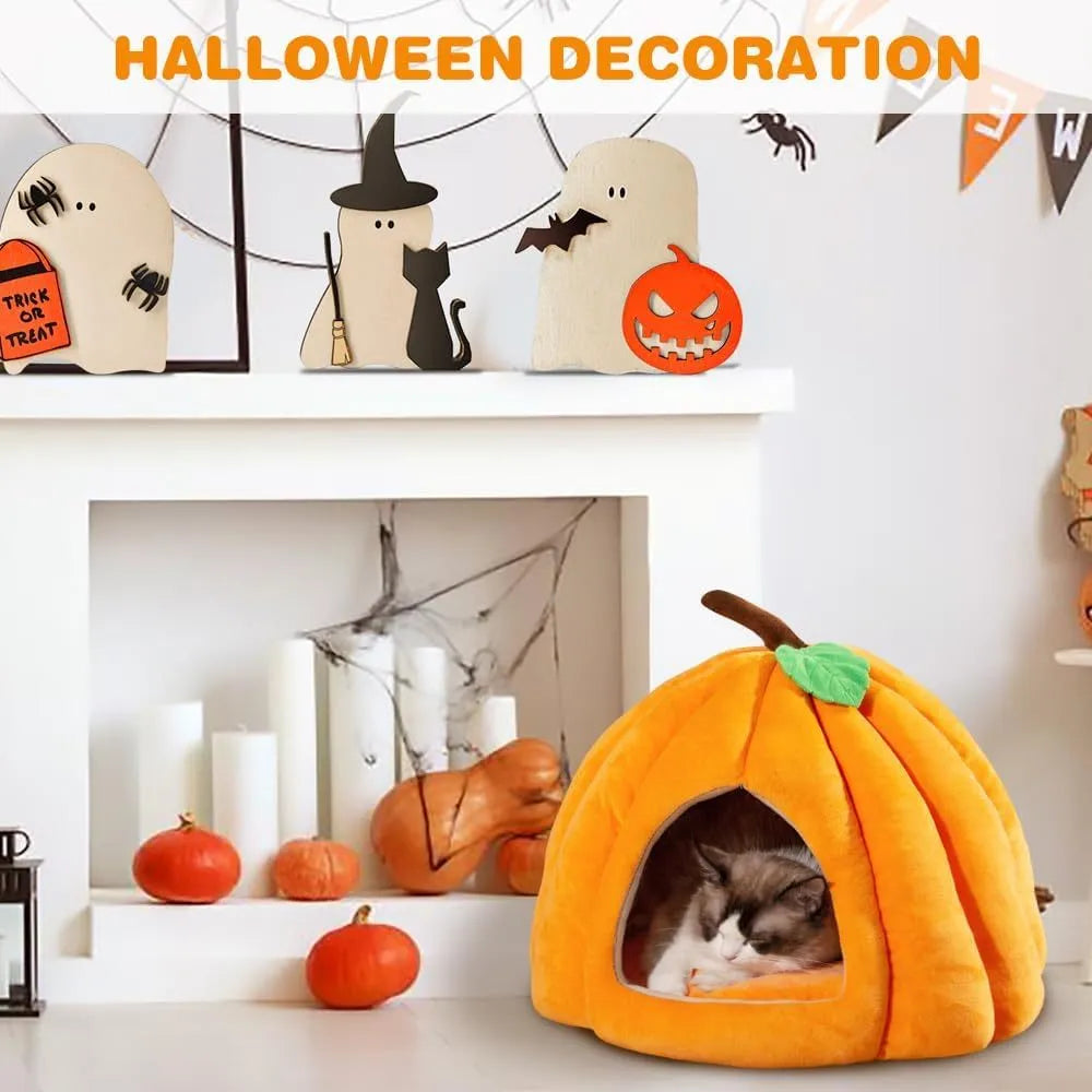 Pumpkin-shaped plush cat cave bed with a round entry hole, shown in blue colour