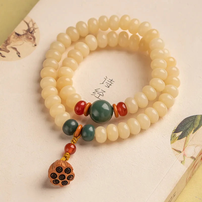 Cream topaz wooden bodhi bracelet with 6 by 9mm flat round beads for women