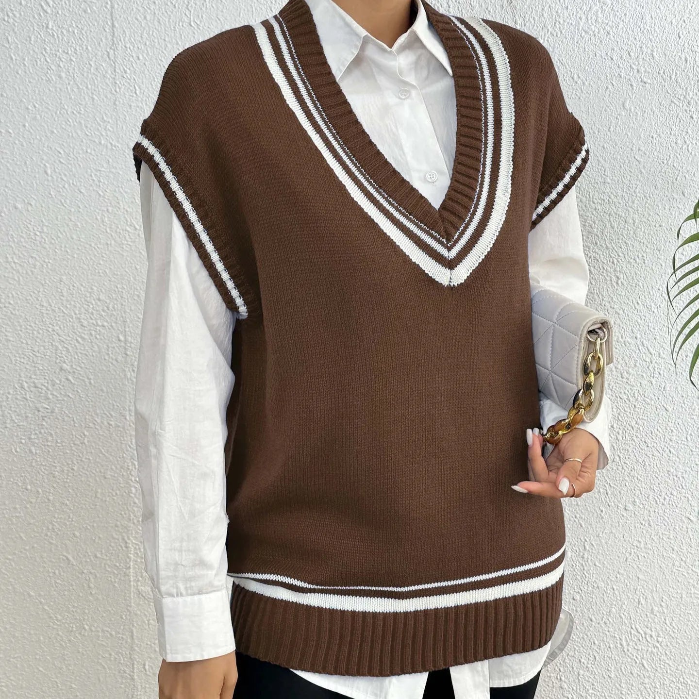 Women's casual wool vest sweater in loose fit free size design showing college style pullover in black blue coffee colour options