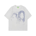 Men's grey loose-fit cotton t-shirt featuring a retro character design print on the chest.