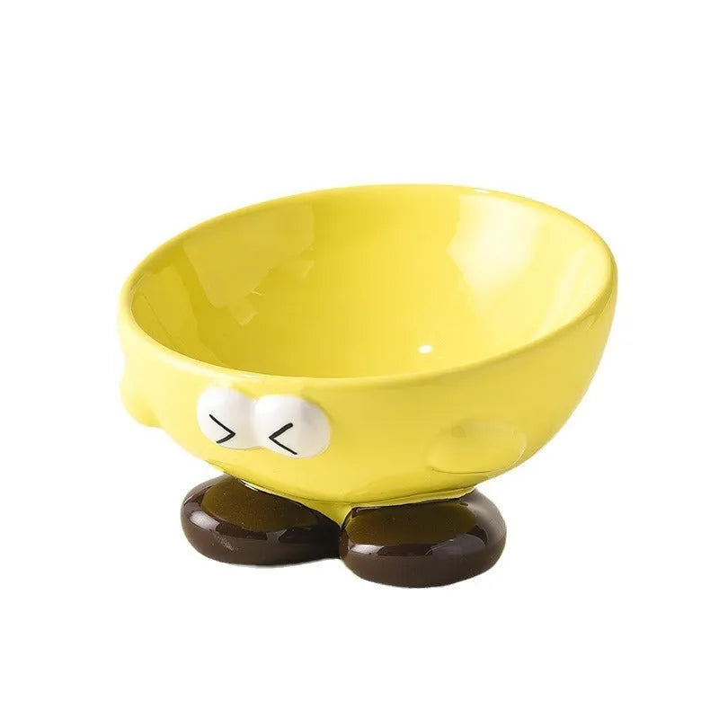 Oblique ceramic pet bowl with cute expression pattern, tall design for cervical spine protection
