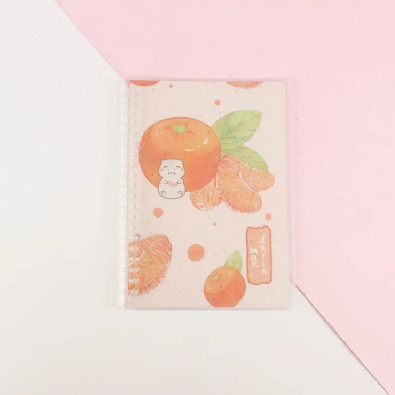 Children's hand-ledger notebook with hardcover showing animal designs including whale and fruit patterns