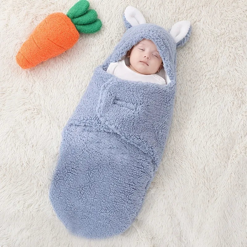 Baby wearing soft fleece sleeping bag with head support and velcro closures
